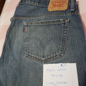 Levi's.  Loose, straight fit.   34x34